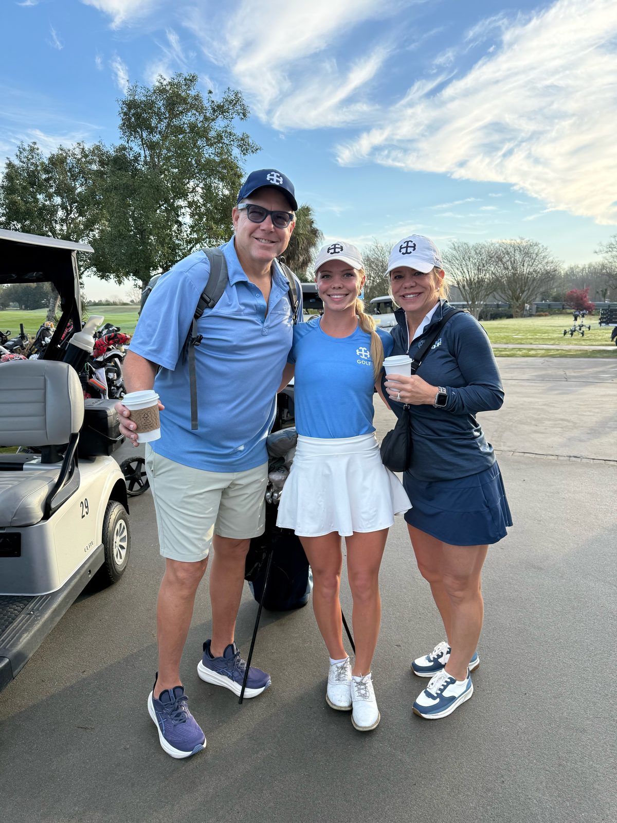 With mom and dad (Connie and Michael) at the 2026 Savannah Invitational during her Saint Mary's career.