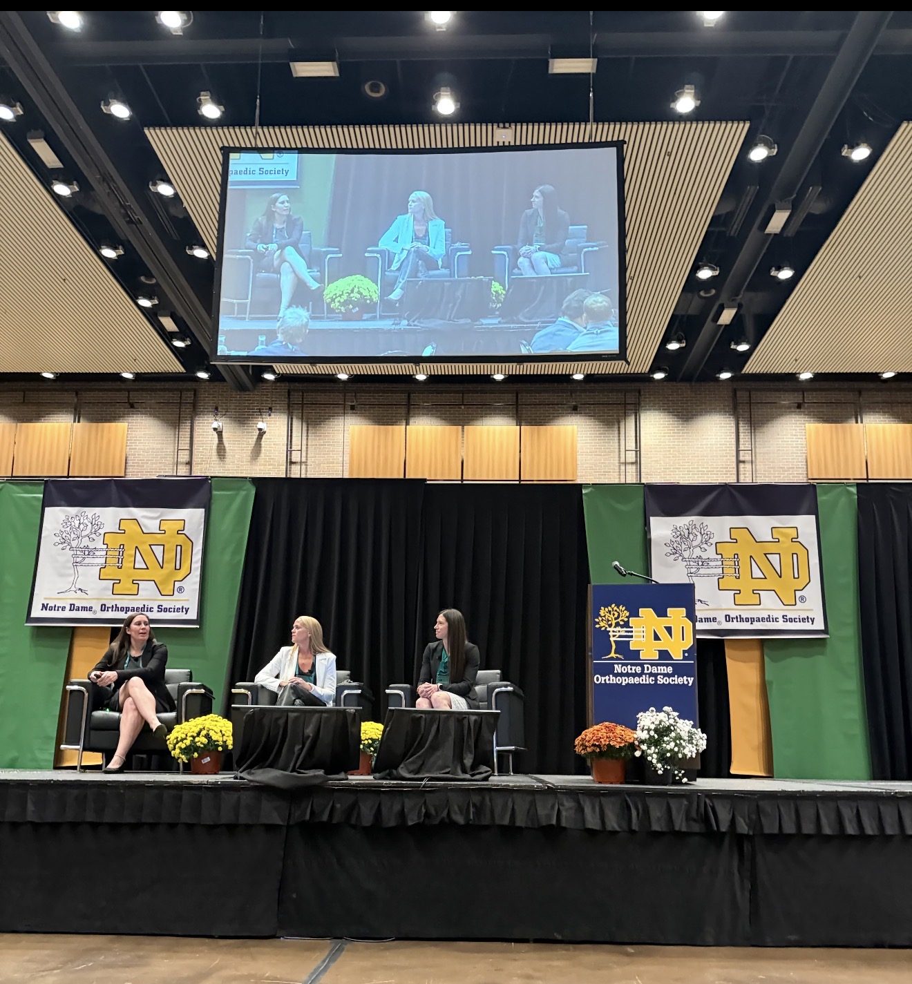 The “Fighting for the Female Athlete” panel on the main stage at the 30th annual symposium